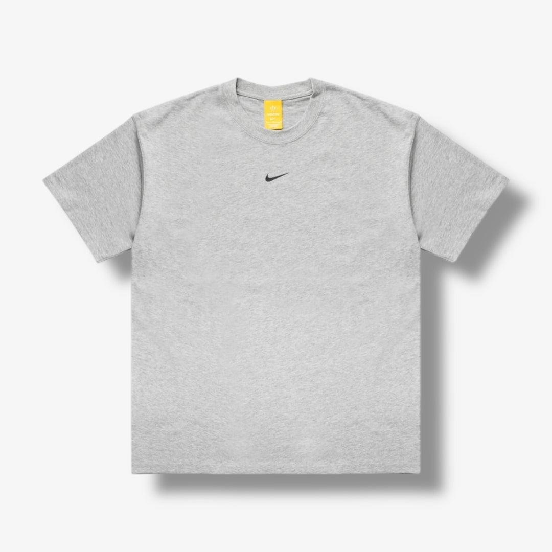 Nike NOCTA Tee DK GREY HEATHER/MATTE SILVER/BLACK IB5673-063